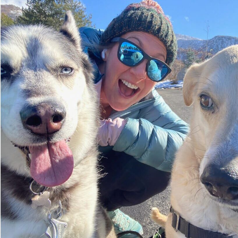 Dr. Caitlin Flanagan - female posing with 2 large breed dogs